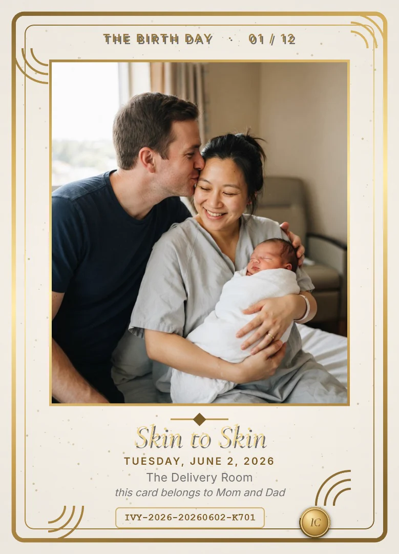 A father kissing his smiling wife&rsquo;s forehead as she holds their swaddled newborn, on an ivory and gold keepsake card